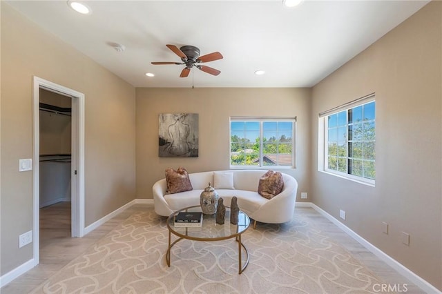 living room with ceiling fan