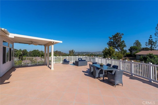 view of patio / terrace with an outdoor living space and ceiling fan