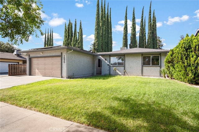 single story home with a front lawn and a garage