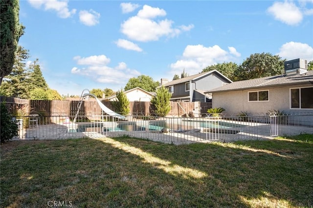 view of yard featuring a patio area, a fenced backyard, a fenced in pool, and central air condition unit