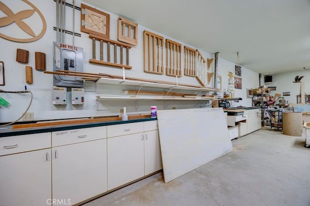 kitchen featuring white cabinets