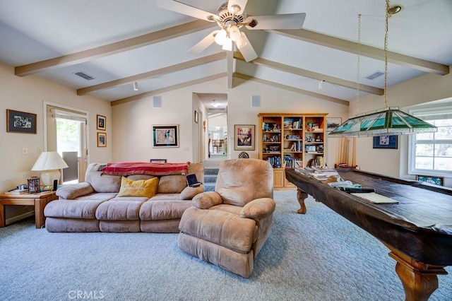 living room with ceiling fan, carpet flooring, and vaulted ceiling with beams