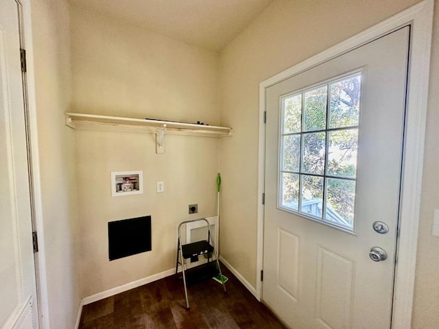 clothes washing area featuring electric dryer hookup, washer hookup, and dark hardwood / wood-style flooring