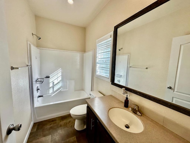 full bathroom featuring vanity, toilet, tub / shower combination, and hardwood / wood-style floors