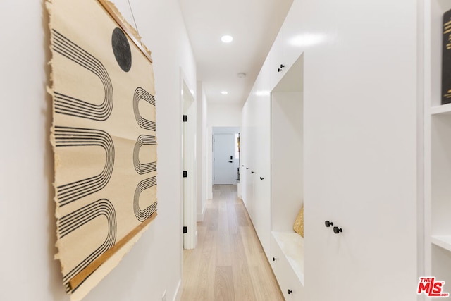 hallway featuring light hardwood / wood-style floors