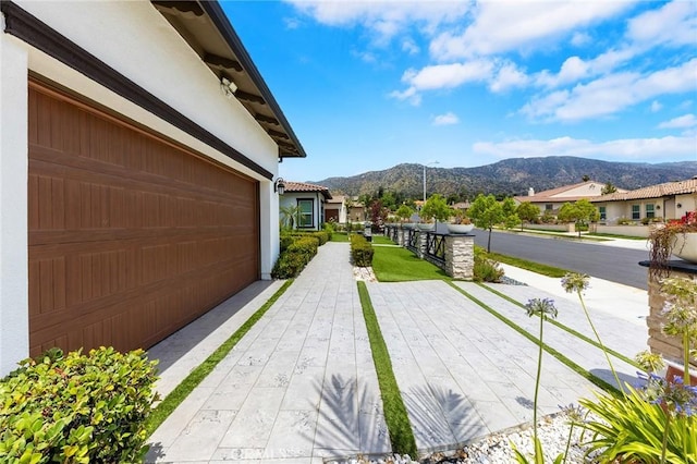 exterior space featuring a mountain view