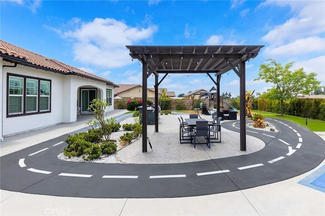 exterior space featuring a pergola and a patio area