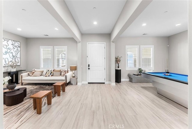 entryway featuring a healthy amount of sunlight, light wood-type flooring, and billiards