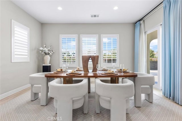 dining room featuring light hardwood / wood-style floors