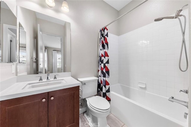 full bathroom with shower / bath combo, vanity, toilet, and tile patterned floors