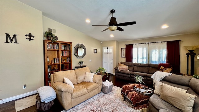 living room featuring ceiling fan, vaulted ceiling, and hardwood / wood-style floors