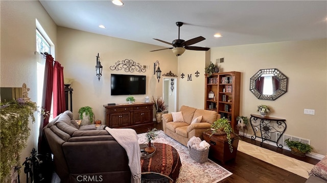 living room with hardwood / wood-style floors and ceiling fan