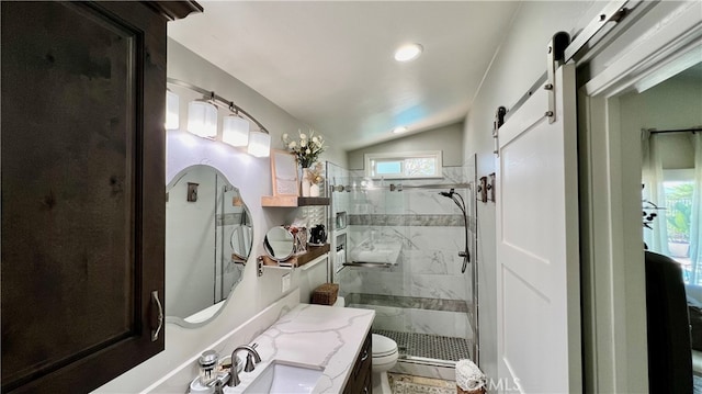 bathroom featuring vaulted ceiling, a shower with door, a healthy amount of sunlight, and toilet