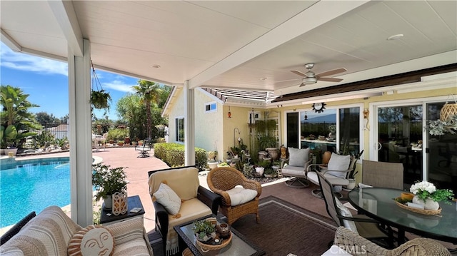 exterior space with ceiling fan, outdoor lounge area, and a patio area