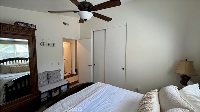 bedroom featuring ceiling fan and a closet