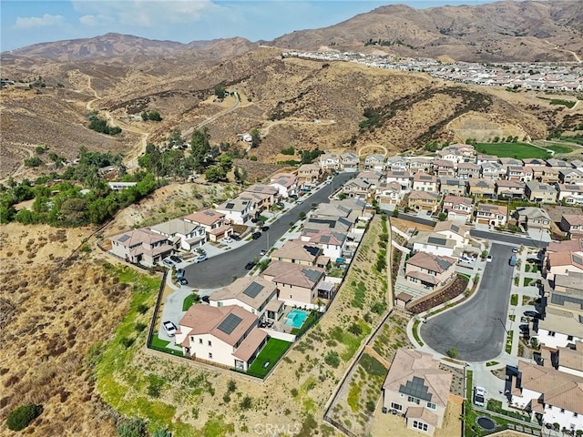 birds eye view of property featuring a residential view and a mountain view