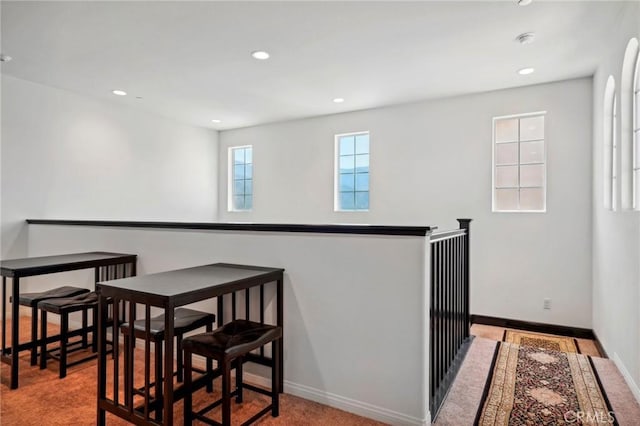 dining space featuring recessed lighting and baseboards