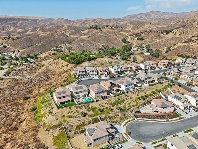 aerial view with a residential view and a mountain view