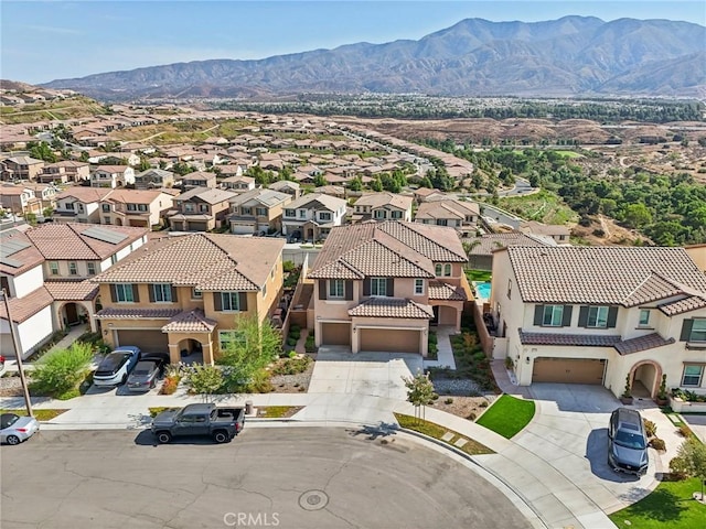 aerial view with a mountain view and a residential view