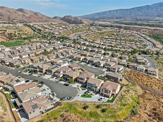 drone / aerial view with a residential view and a mountain view