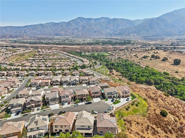 drone / aerial view with a residential view and a mountain view