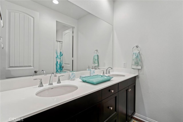 bathroom with double sink vanity