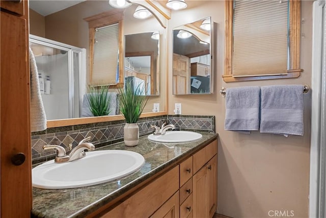 bathroom with tasteful backsplash and vanity