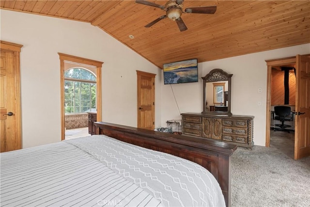 bedroom with light colored carpet, vaulted ceiling, ceiling fan, and wooden ceiling