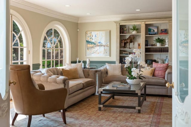 living area featuring ornamental molding