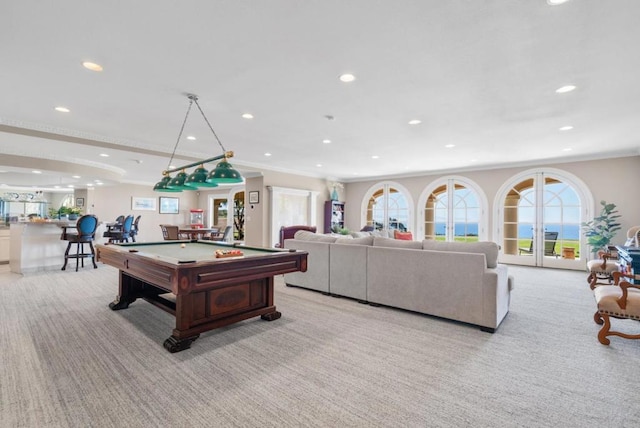 game room with crown molding, light carpet, and billiards