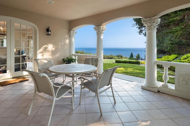 view of patio featuring a water view