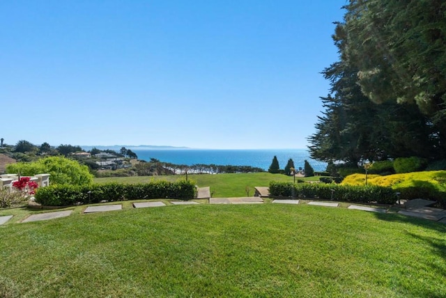 view of yard with a water view