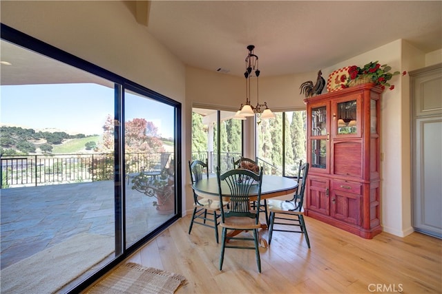 dining area with light wood-type flooring