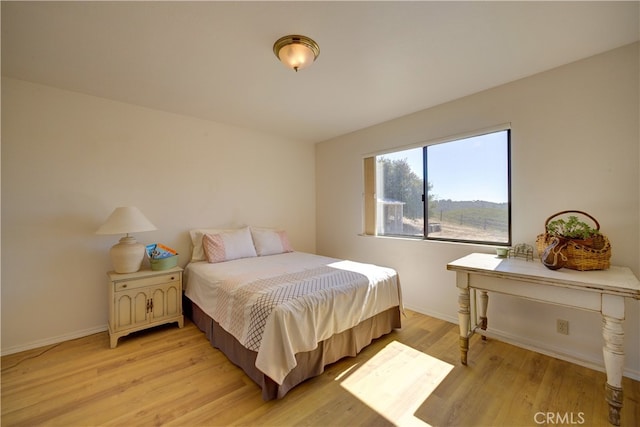 bedroom featuring light hardwood / wood-style floors