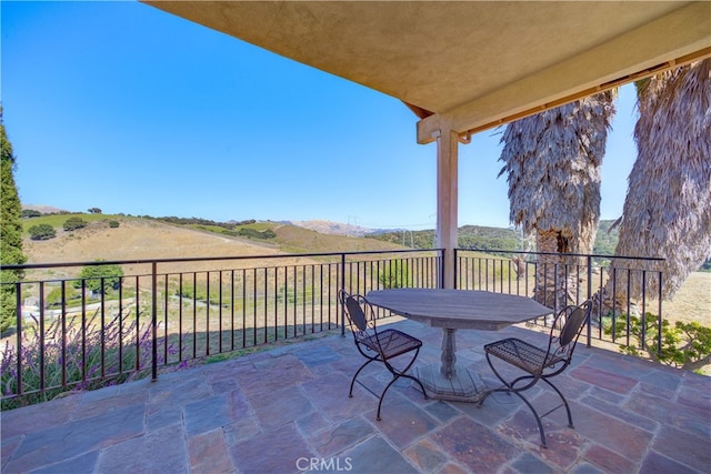 view of patio with a mountain view