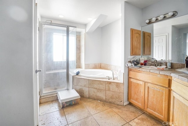 bathroom with vanity, separate shower and tub, and tile patterned flooring