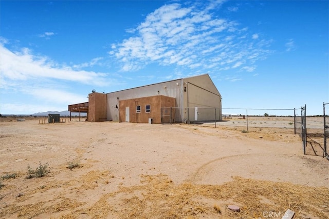 view of outbuilding with a rural view