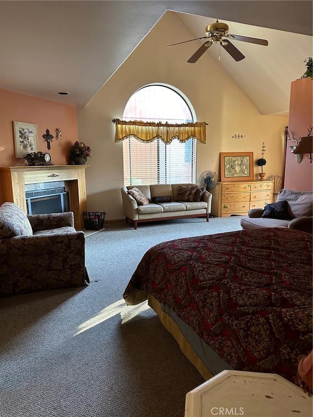 carpeted bedroom with ceiling fan and lofted ceiling