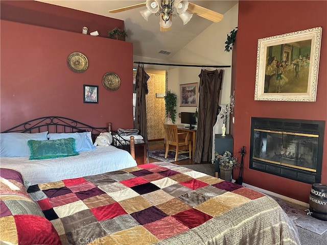 bedroom featuring vaulted ceiling and ceiling fan