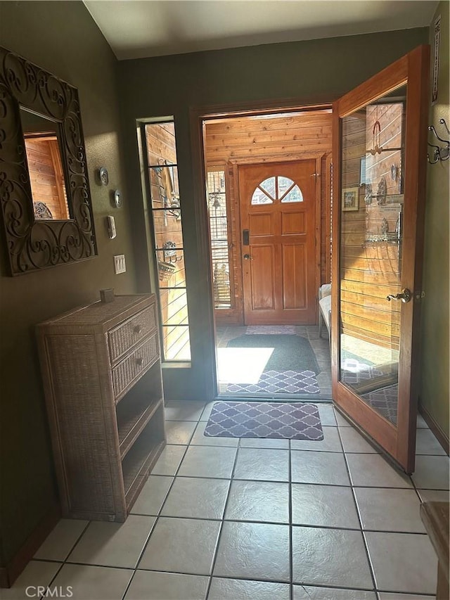 entrance foyer with light tile patterned floors