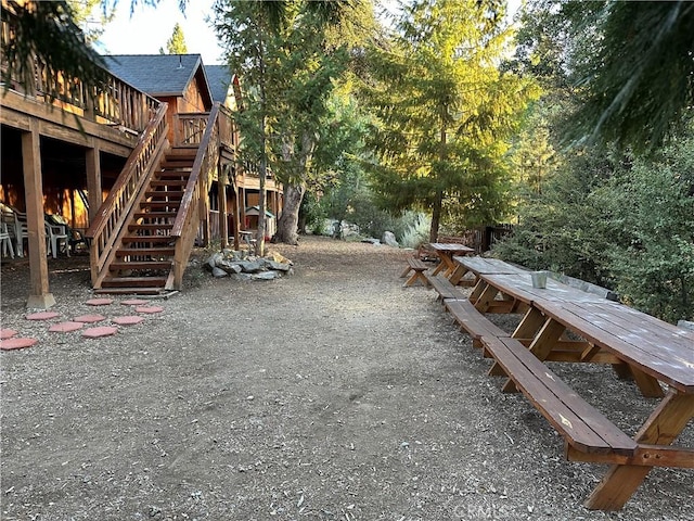 view of yard with a wooden deck