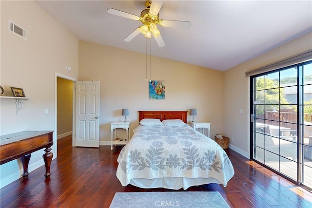 bedroom with ceiling fan, dark hardwood / wood-style flooring, and lofted ceiling