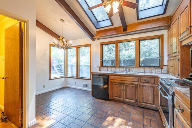 kitchen featuring sink, dishwasher, range, hanging light fixtures, and lofted ceiling with skylight