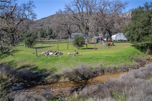 exterior space featuring a mountain view and a rural view