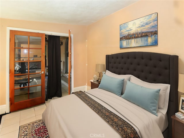 bedroom featuring light tile patterned flooring