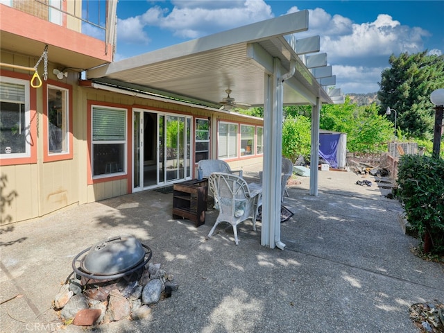 view of patio featuring ceiling fan