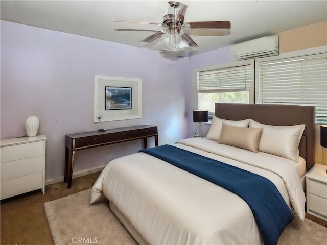 carpeted bedroom featuring a wall mounted AC and ceiling fan