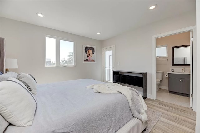 2151 S W View St, Los Angeles, CA 90016 - bedroom with light wood finished floors, recessed lighting, and connected bathroom