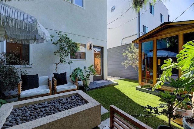 2151 S W View St, Los Angeles, CA 90016 - view of grassy yard featuring an outdoor fire pit
