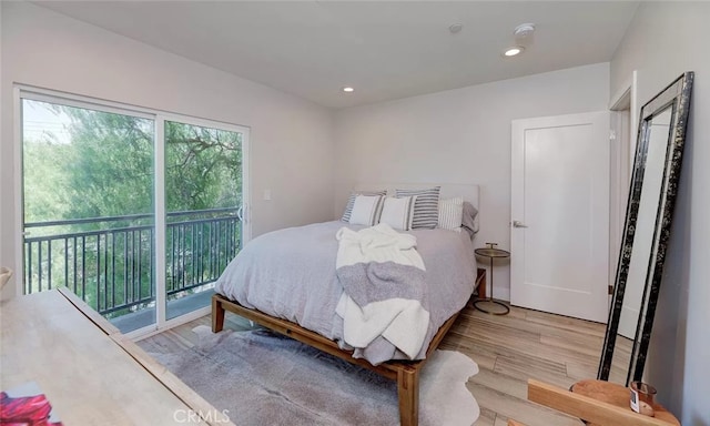 2151 S W View St, Los Angeles, CA 90016 - bedroom featuring access to exterior, wood finished floors, and recessed lighting